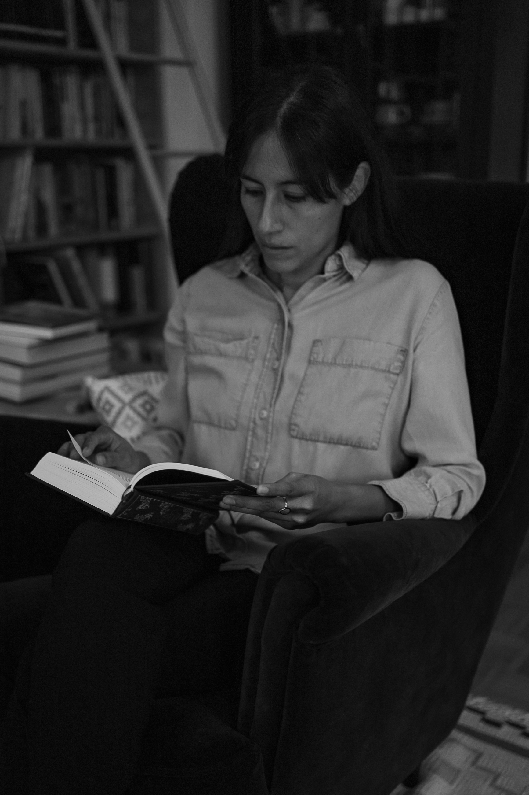 Jaclyn reading a book.